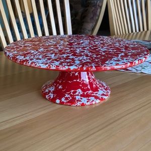 Red and white enamel cake plate